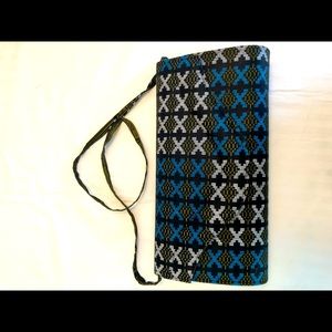 Blue, black and white pocketbook.